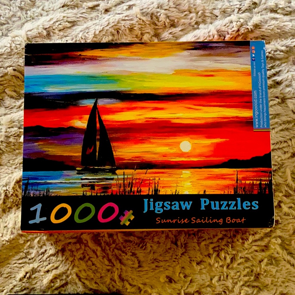 Multicolored sunset and sailboat jigsaw puzzle - 1000 pieces